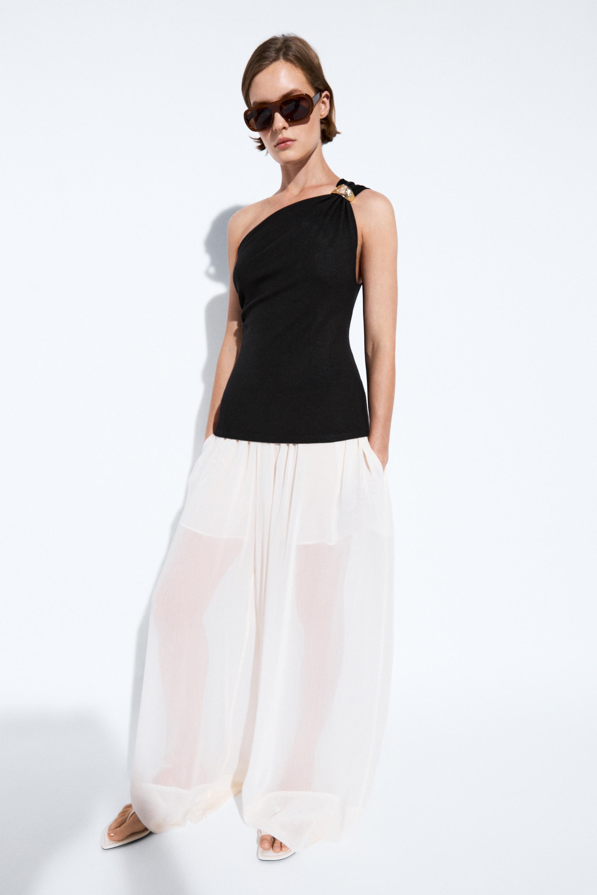 Asymmetric top with metal detail